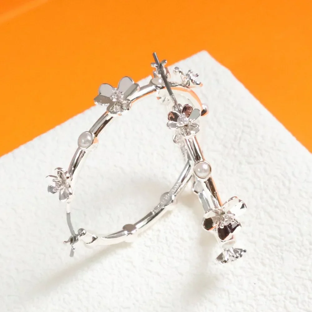 Eternity Silver Hoop Earrings by Alicia Bonnie